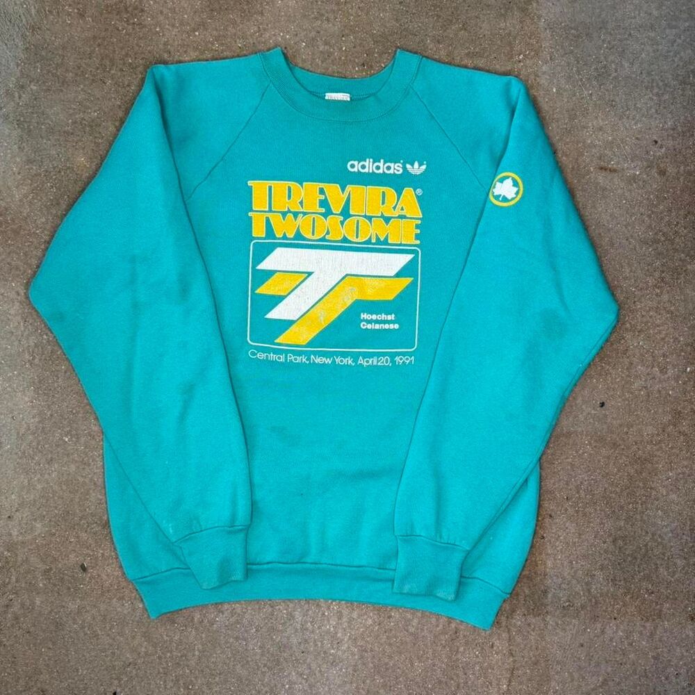 Vintage Adidas Trevira crewneck in teal with bold graphic. Made in USA